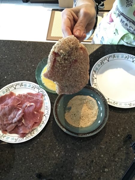 Coating the cutlets with egg and breadcrumbs